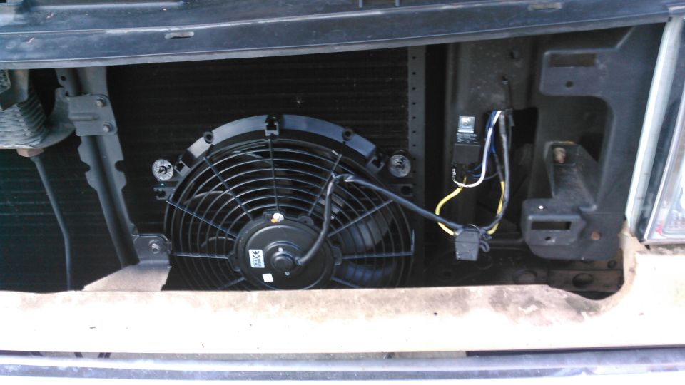 added an electric fan for the A/C condenser. wired it and the A/C clutch to a relay
