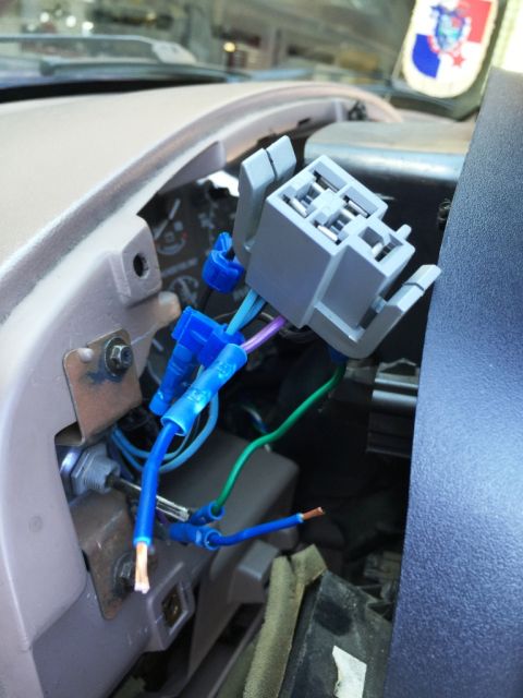 1996 Ford Bronco - Splicing wires in. I added these modules to the rear window switch in the dash.