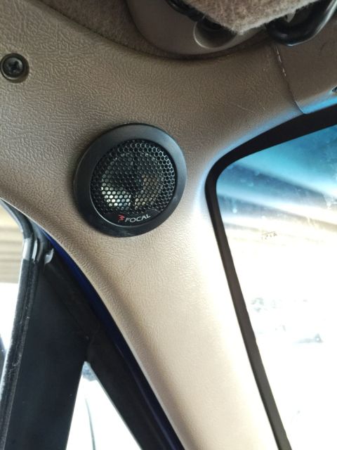 1996 Ford Bronco - A close-up view of a Focal brand speaker mounted on the interior pillar of a vehicle.