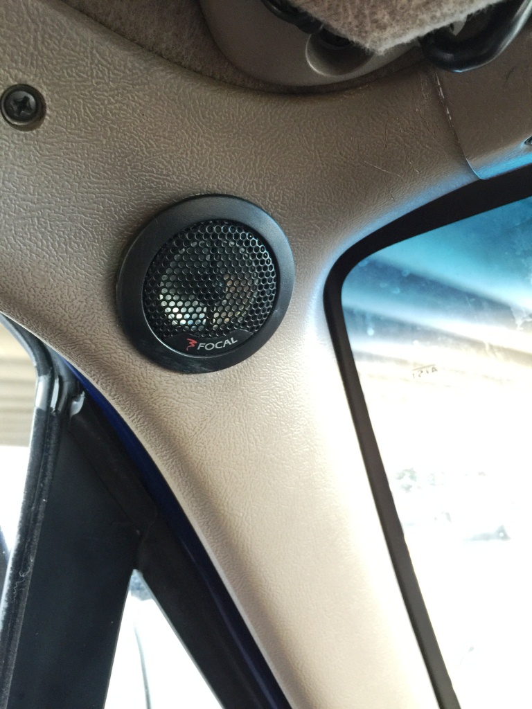 Interior shot of a car's A-pillar with a Focal brand speaker installed