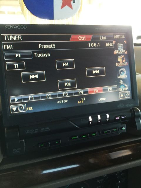 1996 Ford Bronco - The Kenwood tuner display shows FM1 presets and AM/FM tuning options.