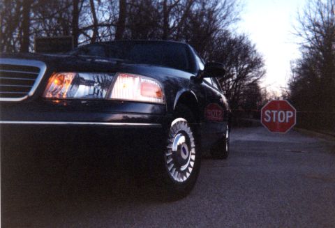 1998 Ford Crown Victoria - So shiny the Stop sign came through...