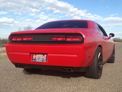 2010 Dodge Challenger - Rear view of a red Dodge Challenger with an Arizona license plate.