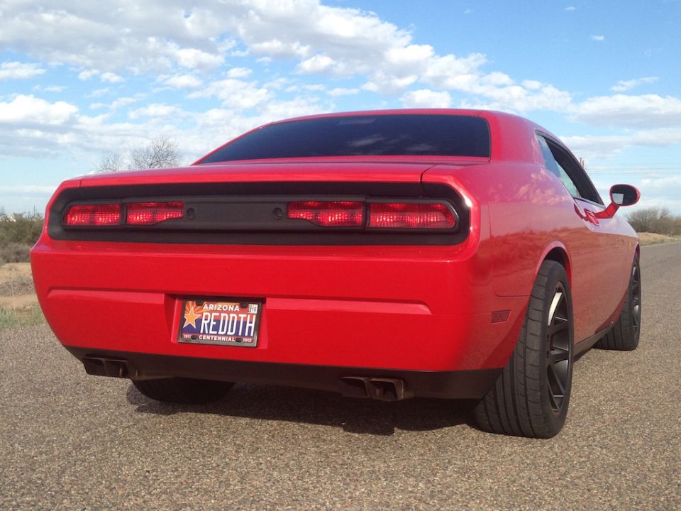 Red Dodge Challenger rear view, Arizona license plate REDDTH