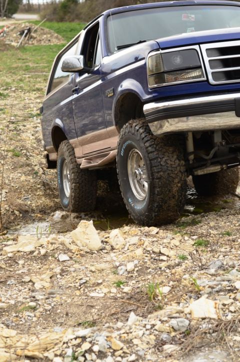 1996 Ford Bronco - This 1996 Ford Bronco is navigating a challenging rocky path.