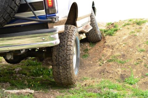 1996 Ford Bronco - This 1996 Ford Bronco is shown from the rear as it navigates an off-road incline.