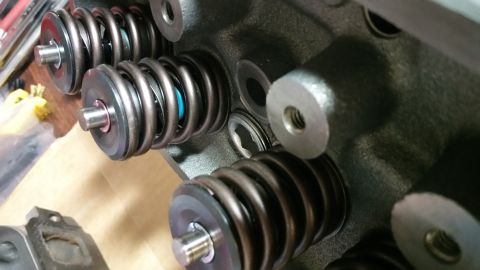 1995 Ford Mustang - Close-up view of the valve springs and retainers on a Ford engine, possibly from a 1995 Mustang.