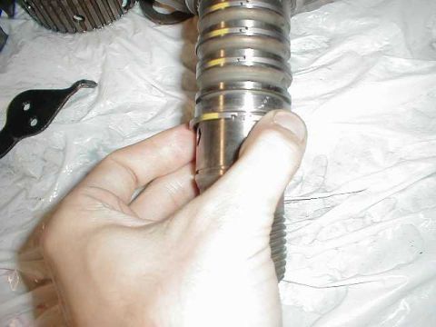 1991 Ford Crown Victoria LTD - There are 6 sealing rings on the output shaft to replace... 2 orange (not shown) and 4 teflon (shown)