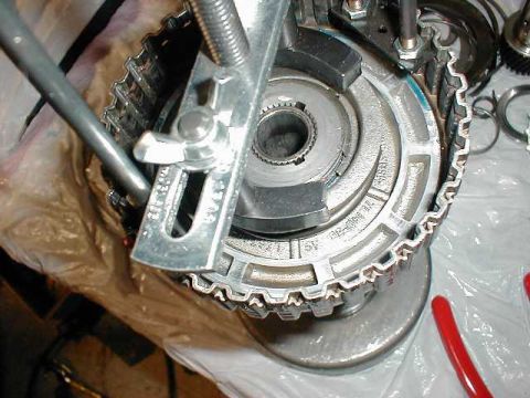 1991 Ford Crown Victoria LTD - Using the spring compressor again to replace the large retaining spring. Yes, this is a pain