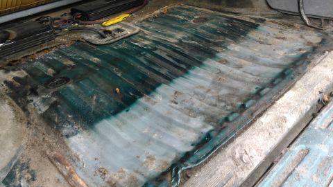 1996 Ford Bronco - ripped the carpet out. you can see how the floor was collapsed down from weight of big toolbox and jacks bouncing around when offroad