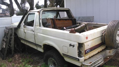 1988 Ford Bronco - truck has been sitting back here for over a year now. tires no longer hold air and i wanted to steal the rims from it to put on my F250. i…
