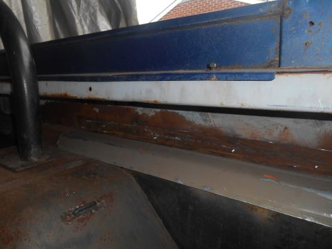1972 Ford Bronco - The interior of this vehicle shows extensive rust damage, particularly along the lower body panels and floor.