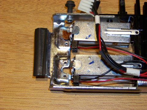 1999 Mercury Grand Marquis - Close-up view of electronic components and wiring on a wooden surface. The components appear to be part of a device, possibly a radio or co…