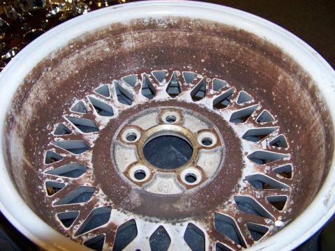 1999 Mercury Grand Marquis - This image shows a heavily corroded aluminum wheel, not a 1999 Mercury Grand Marquis.