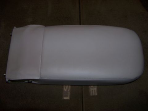 1999 Mercury Grand Marquis - A close-up view of a vehicle's armrest, showing its material and stitching.