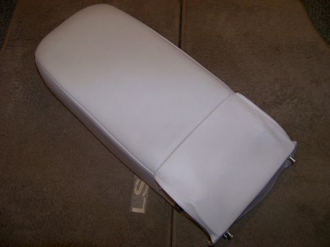 1999 Mercury Grand Marquis - Close-up of a car armrest, likely from a sedan's center console.