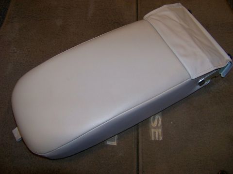 1999 Mercury Grand Marquis - Close-up of a car's center console armrest, likely for a sedan.