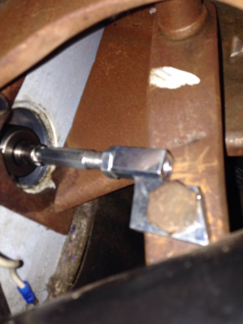 1979 Ford Bronco - Close-up view of a mechanical linkage assembly inside a vehicle's interior.