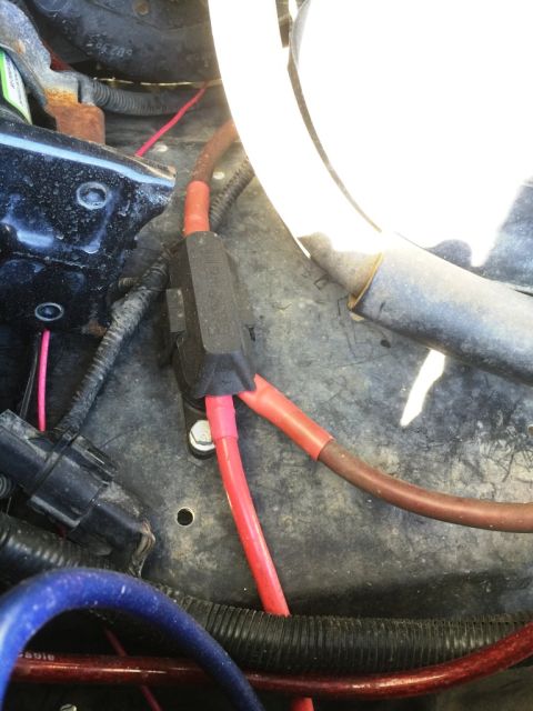 1996 Ford Bronco - Engine bay wiring with a fuse holder and red/brown cables visible.