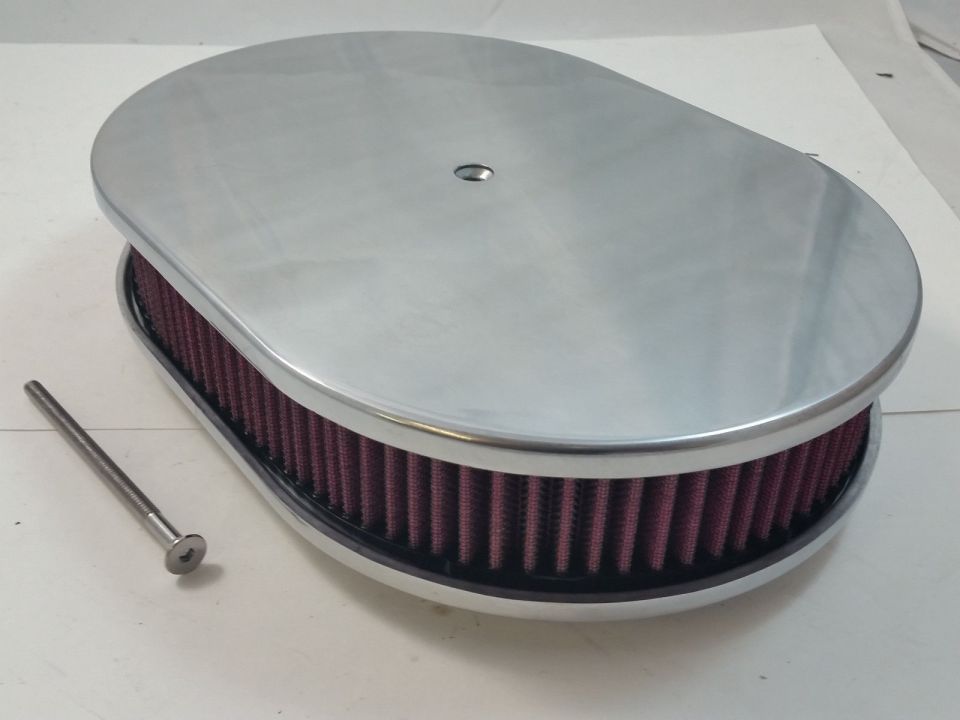 oval air cleaner with red filter element and chrome lid, next to a bolt
