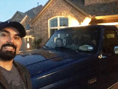 1996 Ford Bronco - Selfie with a 1996 Ford Bronco in front of a brick house.