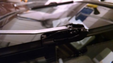 1979 Ford F-150 - Close-up of a windshield wiper assembly, with SuperMotors.net logo visible.