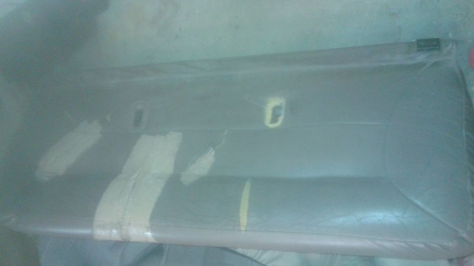 Interior door panel with yellow tape accents