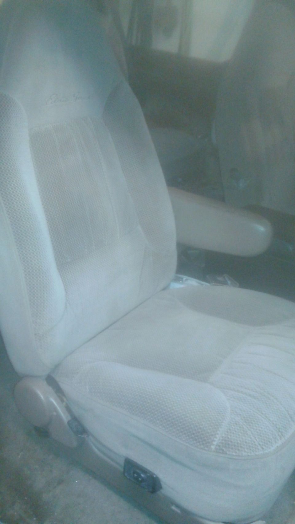 1996 Ford Bronco interior driver's seat, light tan fabric