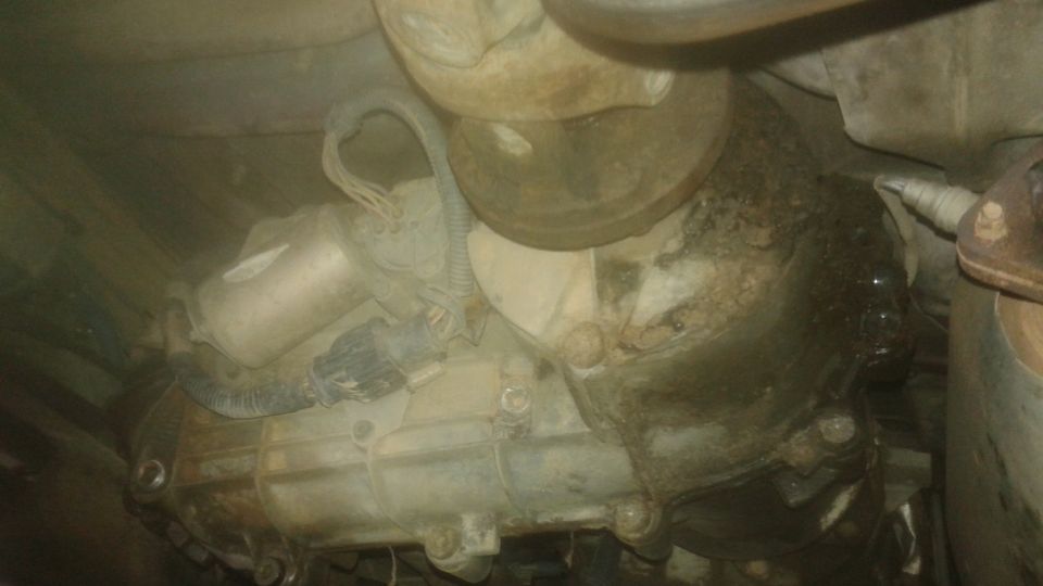 underneath view of a vehicle's transmission and exhaust system