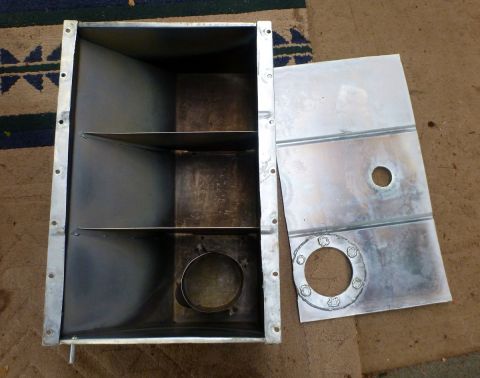 1969 MINI Cooper - An aluminum fuel tank component, likely for a vehicle, is shown disassembled with its lid removed.