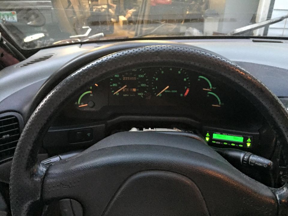 Interior dashboard and steering wheel of a car