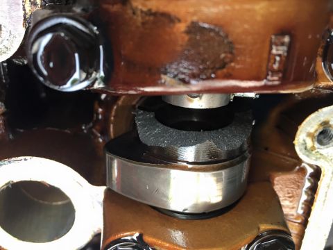 1995 Ford Probe - Engine component detail, likely from a valve train, showing wear and oil. Supermotors.net logo is present.
