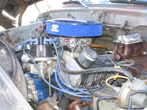 1979 Ford Bronco - Close-up of a Ford V8 engine, showing the air cleaner, carburetor, and valve cover.