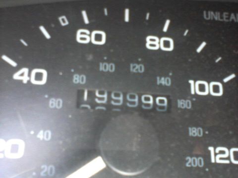 1995 Ford Probe - A close-up shot of a car's odometer showing 199,999 miles. The speedometer is visible with markings up to 160 mph.