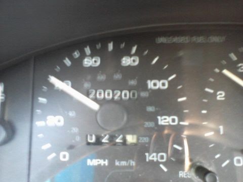1995 Ford Probe - The odometer on a 1995 Ford Probe reads 200,200 miles. The speedometer needle is pointing to approximately 20 mph.