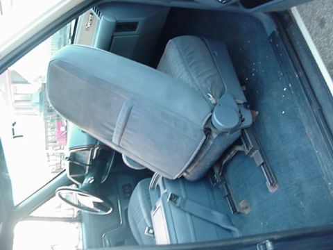 1993 Ford Bronco - Interior view of a 1993 Ford Bronco, showing the front seats and dashboard.