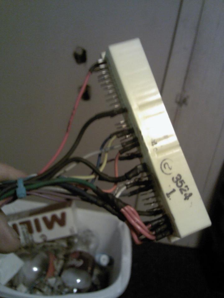 Close-up of electrical connector with wires and text "3524 1."