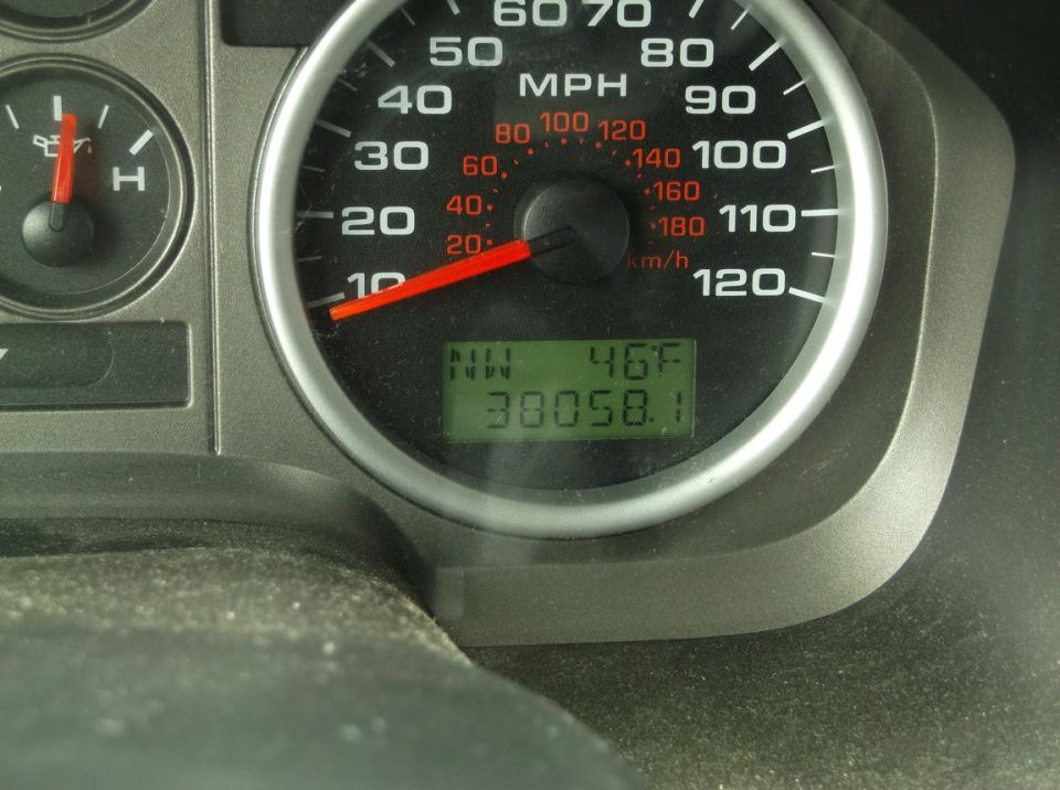 2005 Ford F-150 dashboard showing speedometer, fuel gauge, and odometer reading 30058.1