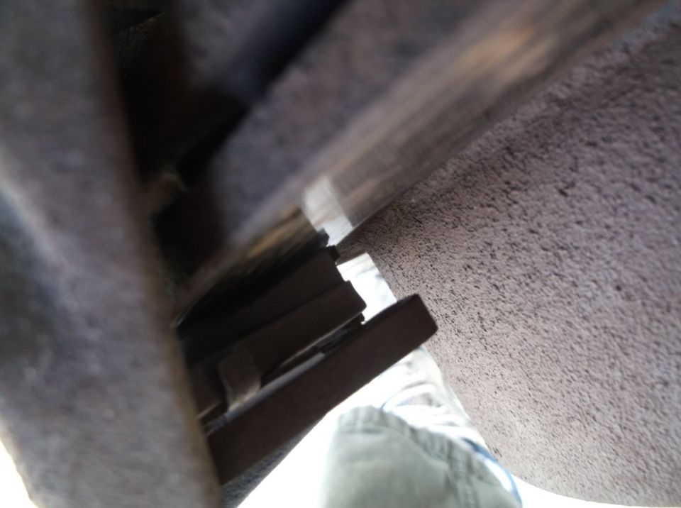 Close-up of brake caliper and rotor assembly