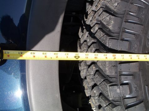 2005 Ford F-150 - Tire diameter is being measured against the vehicle's fender.