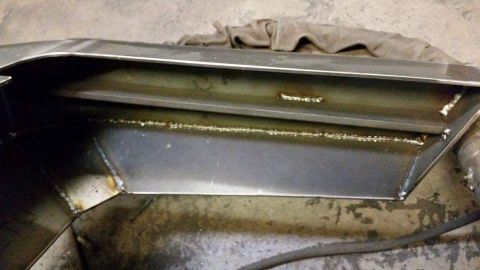 1996 Ford Bronco - This image shows a fabricated metal part with multiple welds, not a vehicle component.