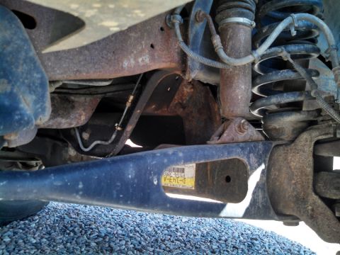 1995 Ford Bronco - Old Stuff: Rough Country 2.5" lifted coils & old Hecklethorn shocks, & stock radius arms