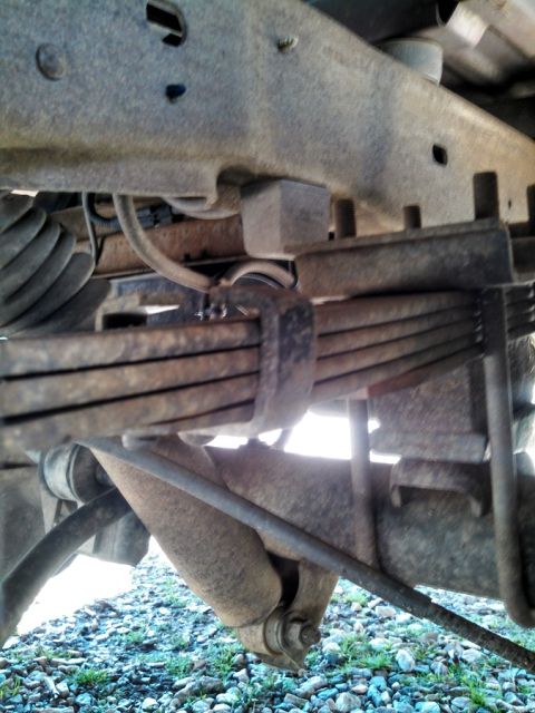 1995 Ford Bronco - Old Stuff: Original leaf springs lifted with Rough Country blocks, old Hecklethorn shocks