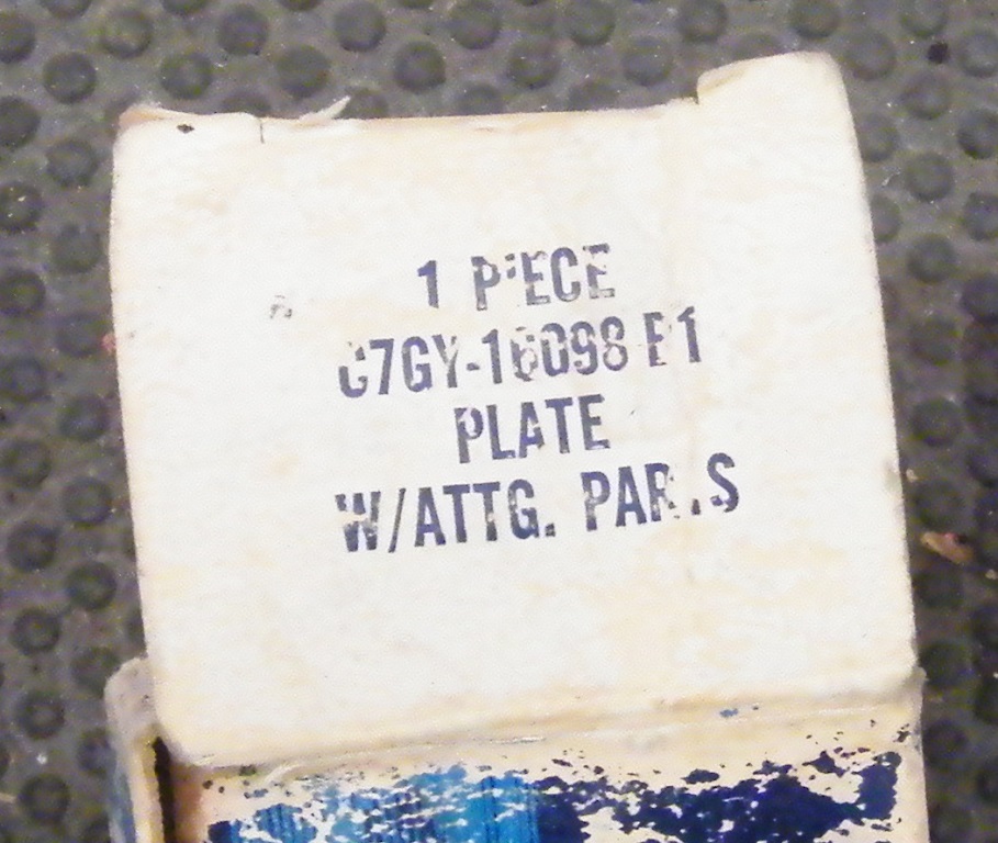 Cardboard box with part number C7GY-16098 F1 and text PLATE W/ATTG. PAR.S