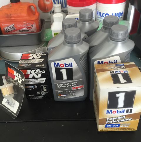 1971 Dodge Dart - A collection of Mobil 1 synthetic oil and K&N performance oil filters are displayed, ready for vehicle maintenance.