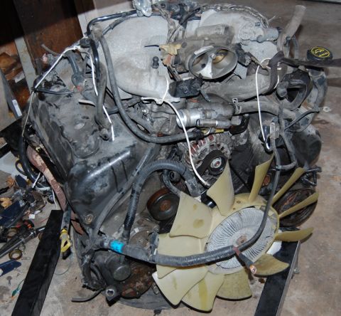 1985 Mercury Grand Marquis - This is a disassembled engine, likely removed from a vehicle for repair or replacement.