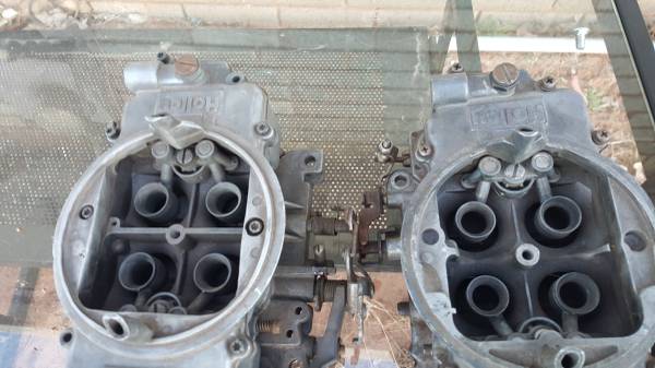 Two Holley carburetors side by side.