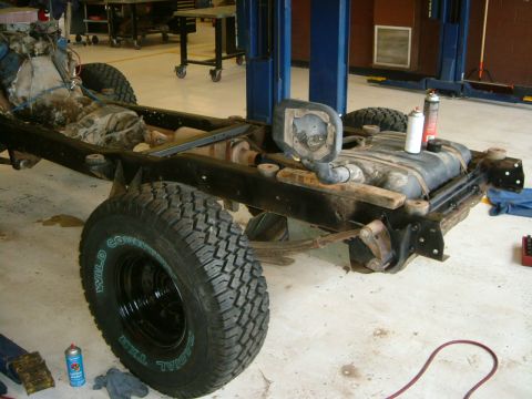 1978 Ford Bronco - The chassis and drivetrain components of a vehicle are shown, possibly undergoing restoration or modification.