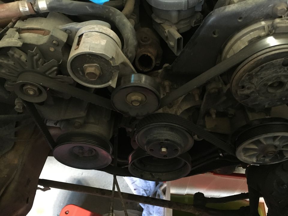Ford Bronco engine serpentine belt system with pulleys and alternator.