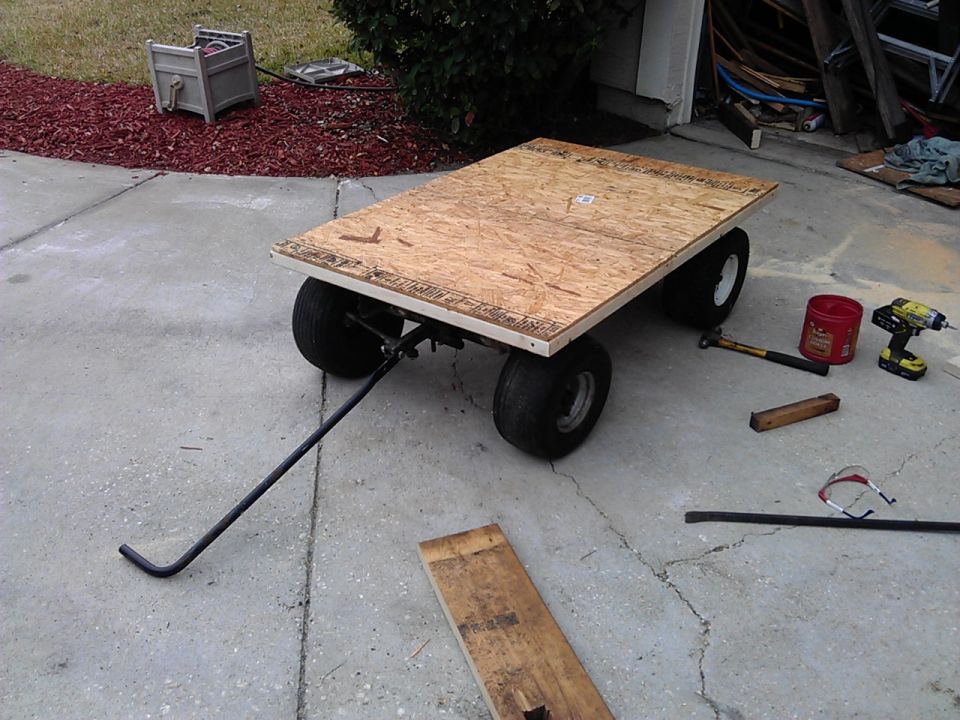 Yard cart with plywood bed and tow handle